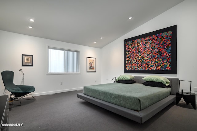 bedroom with lofted ceiling