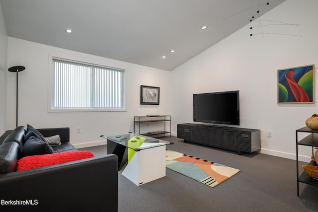 living room featuring high vaulted ceiling