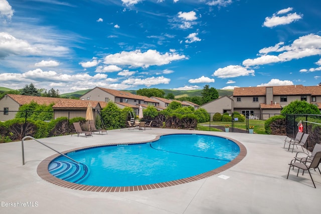 view of pool featuring a patio