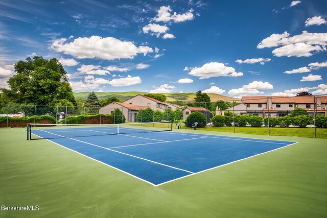 view of sport court featuring basketball court