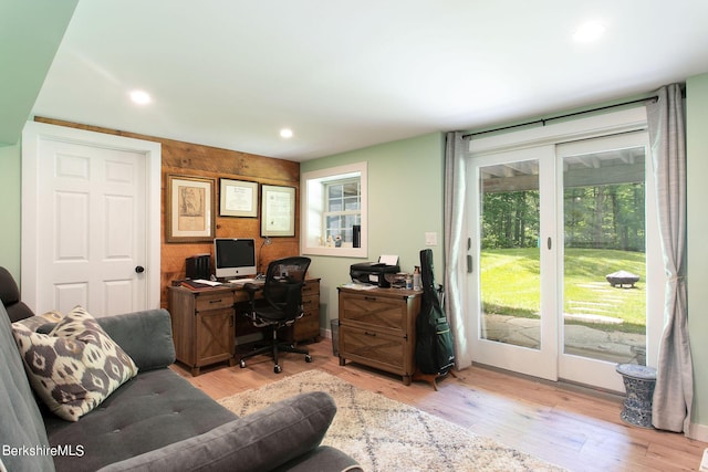 office space with light wood-type flooring and recessed lighting