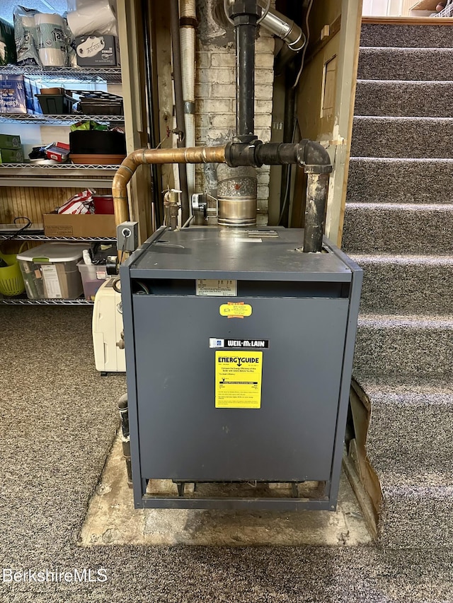 utility room featuring a heating unit