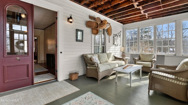 sunroom / solarium featuring plenty of natural light