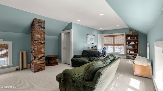 carpeted living area with lofted ceiling, radiator heating unit, baseboards, and recessed lighting