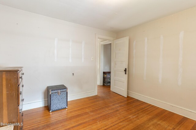 30 Belvidere Ave, Pittsfield, MA 01201 - empty room with wood finished floors and baseboards
