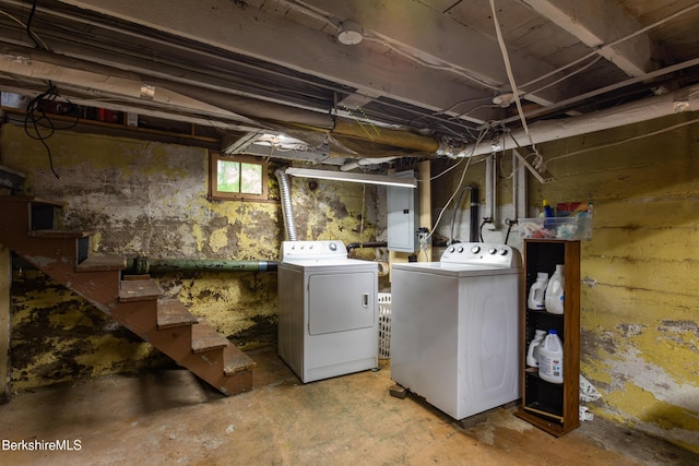 30 Belvidere Ave, Pittsfield, MA 01201 - below grade area with separate washer and dryer, stairway, and electric panel