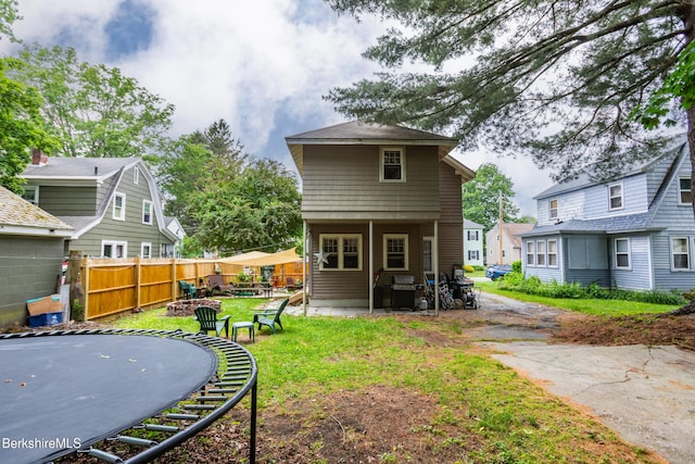 30 Belvidere Ave, Pittsfield, MA 01201 - back of property with a patio and a trampoline