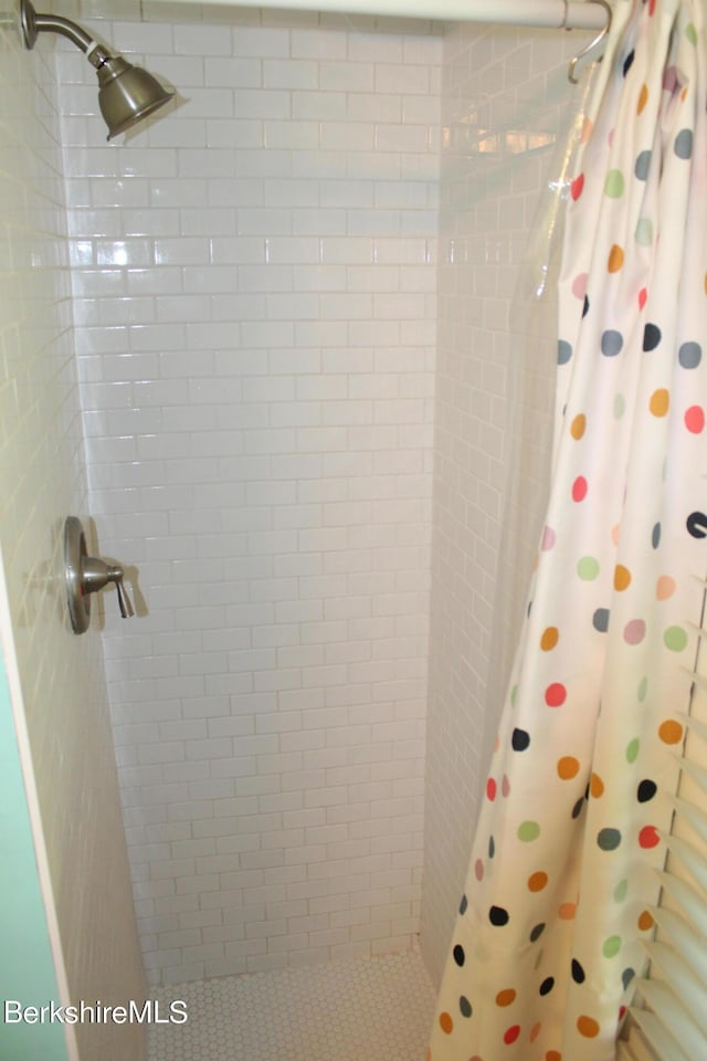 bathroom with walk in shower