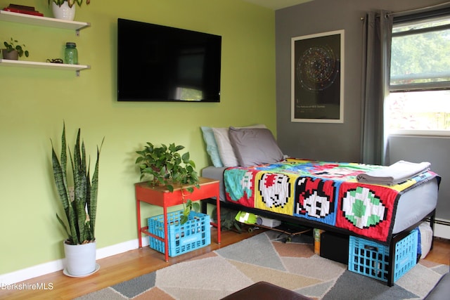 bedroom featuring hardwood / wood-style flooring