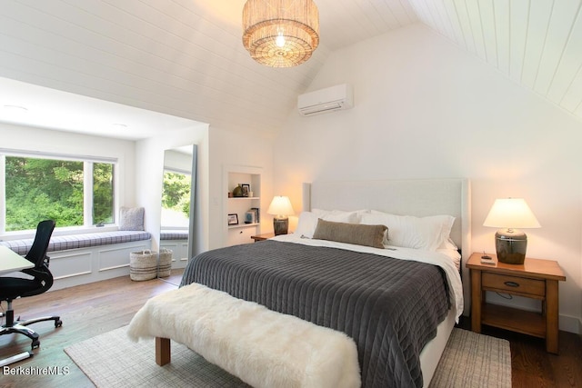 20 Hillside Ln, Sheffield, MA 01222 - bedroom featuring a wall mounted AC, vaulted ceiling, wood finished floors, and a desk