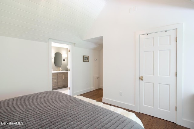 20 Hillside Ln, Sheffield, MA 01222 - bedroom with wood finished floors, a sink, vaulted ceiling, and ensuite bathroom