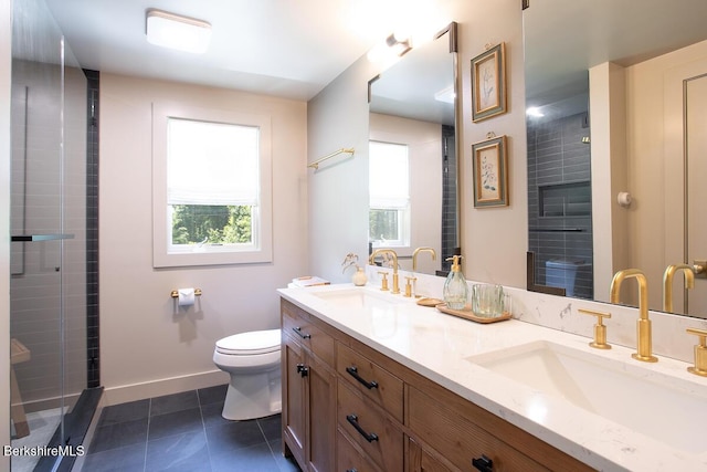 20 Hillside Ln, Sheffield, MA 01222 - bathroom featuring toilet, double vanity, tile patterned floors, baseboards, and an enclosed shower