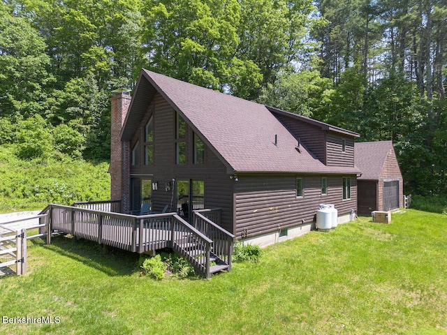 20 Hillside Ln, Sheffield, MA 01222 - rear view of property featuring a shingled roof, a yard, and a chimney