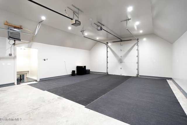 20 Hillside Ln, Sheffield, MA 01222 - garage with a garage door opener, a heating unit, and baseboards