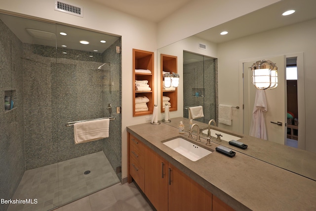 full bathroom with recessed lighting, visible vents, a shower stall, and vanity