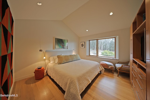 bedroom with recessed lighting, light wood-type flooring, baseboards, and vaulted ceiling