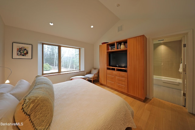 bedroom featuring visible vents, recessed lighting, light wood-type flooring, and vaulted ceiling