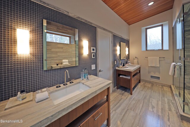 113 Brush Hill Rd, Great Barrington, MA 01230 - full bathroom with vaulted ceiling, two vanities, wood ceiling, a shower with shower door, and healthy amount of natural light