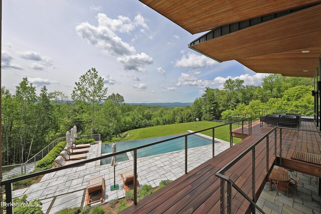 113 Brush Hill Rd, Great Barrington, MA 01230 - deck with a patio, a wooded view, and a lawn