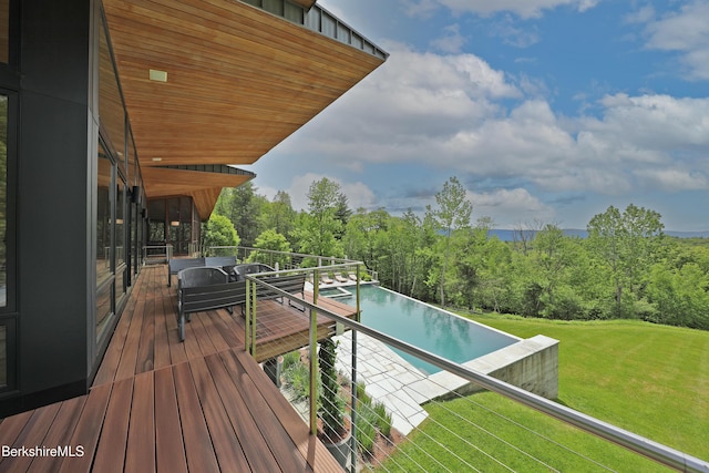 113 Brush Hill Rd, Great Barrington, MA 01230 - wooden deck featuring an infinity pool and a lawn