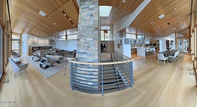 113 Brush Hill Rd, Great Barrington, MA 01230 - living area with light wood-type flooring, wood ceiling, decorative columns, lofted ceiling, and recessed lighting