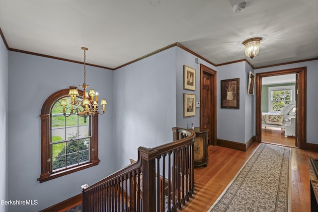 68 Colt Rd, Pittsfield, MA 01201 - hall featuring an upstairs landing, a chandelier, hardwood / wood-style floors, baseboards, and ornamental molding