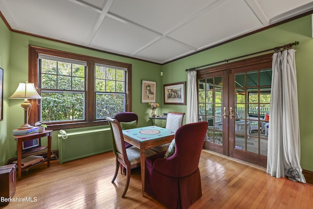 68 Colt Rd, Pittsfield, MA 01201 - dining space featuring french doors, coffered ceiling, radiator, and wood-type flooring