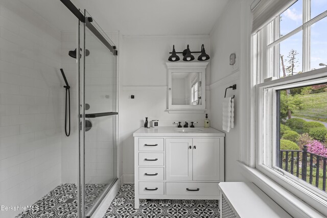 68 Colt Rd, Pittsfield, MA 01201 - bathroom with radiator heating unit, a shower stall, healthy amount of natural light, and vanity