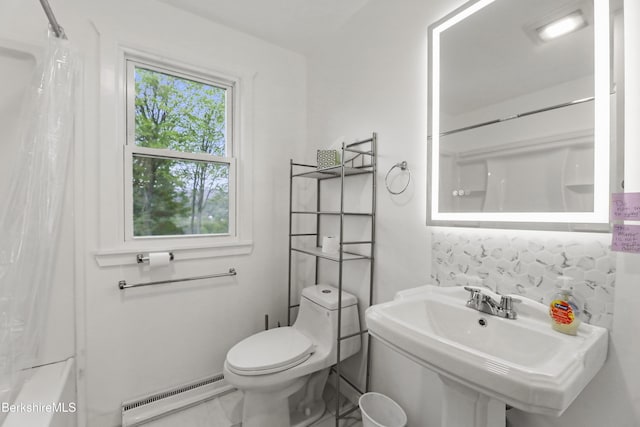 bathroom featuring a baseboard heating unit, a sink, toilet, decorative backsplash, and shower / bathtub combination with curtain
