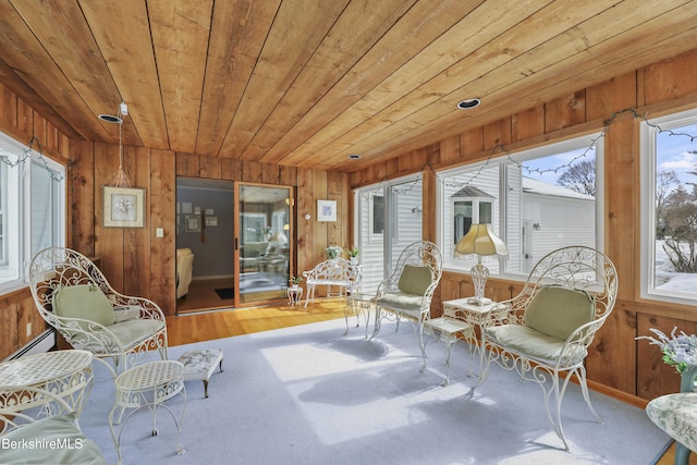 sunroom with wood ceiling