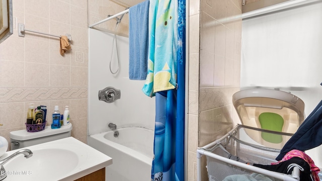 14 Hall St, North Adams, MA 01247 - full bath featuring tile walls, shower / tub combo with curtain, vanity, and toilet