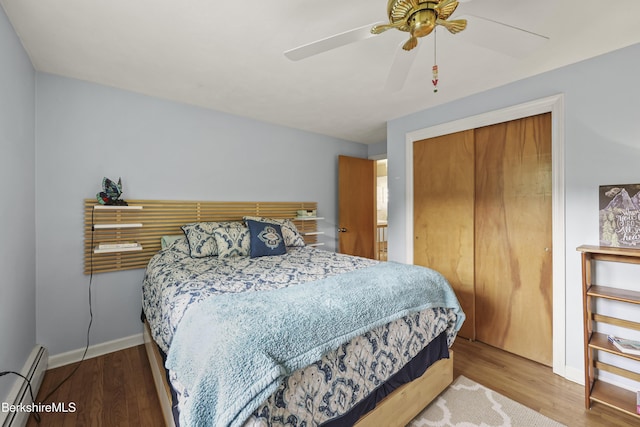 785 E New Lenox Rd, Pittsfield, MA 01201 - bedroom featuring a baseboard radiator, wood finished floors, a closet, and a ceiling fan