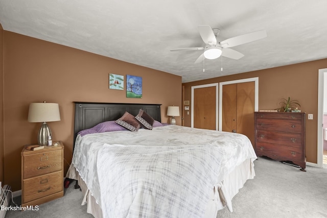 785 E New Lenox Rd, Pittsfield, MA 01201 - carpeted bedroom with two closets and ceiling fan