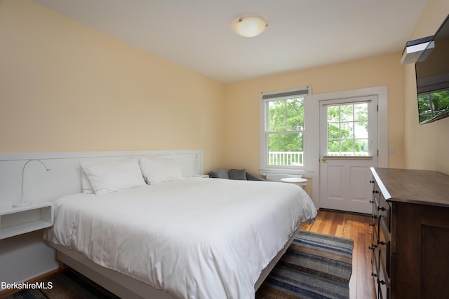 bedroom featuring light wood-style floors