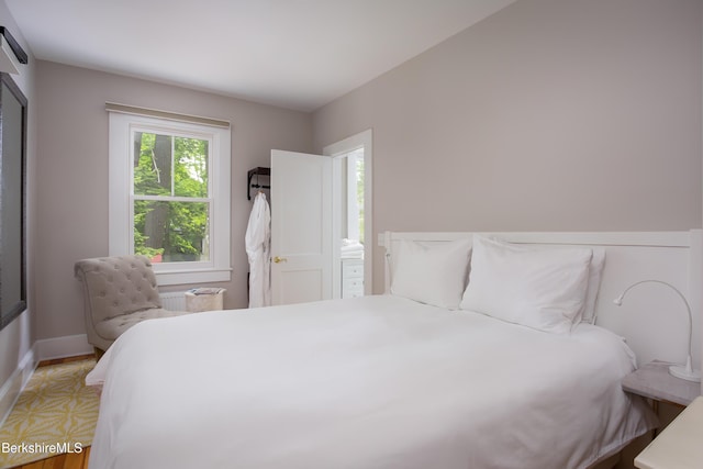 bedroom featuring baseboards