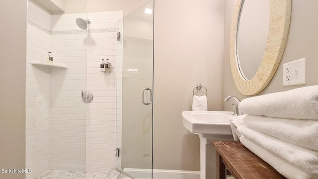 bathroom featuring a stall shower