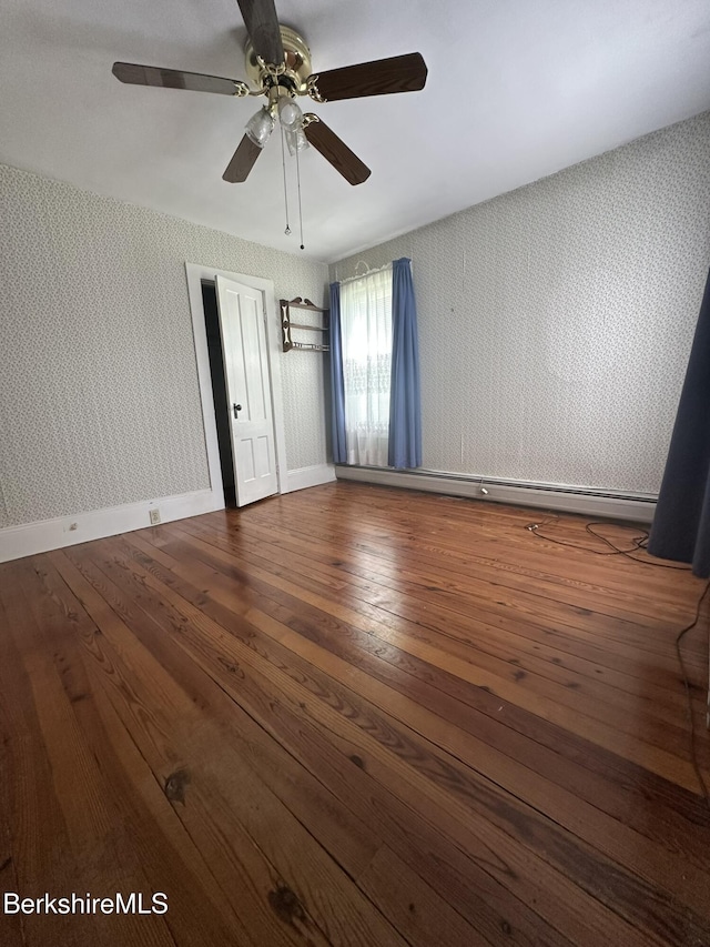 132-134 Crest St, North Adams, MA 01247 - unfurnished room featuring wallpapered walls, wood-type flooring, a baseboard heating unit, and ceiling fan