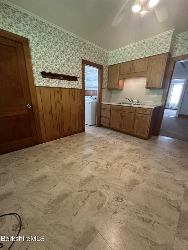 132-134 Crest St, North Adams, MA 01247 - kitchen with washer / clothes dryer, wallpapered walls, wainscoting, brown cabinets, and ceiling fan