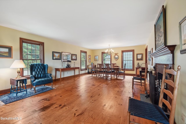 interior space with hardwood / wood-style flooring and a notable chandelier