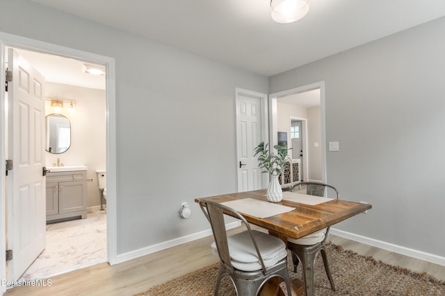 24 Front St Unit 22-24, Williamstown, MA 01267 - dining area featuring baseboards and light wood-style floors