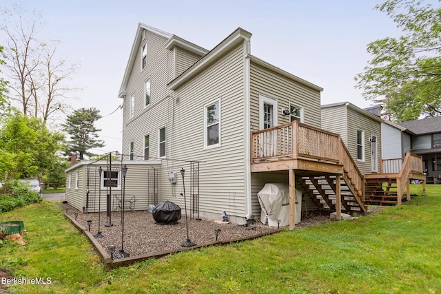 24 Front St Unit 22-24, Williamstown, MA 01267 - rear view of house featuring stairs, a deck, and a lawn
