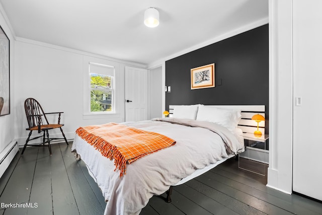 49 S St, Great Barrington, MA 01230 - bedroom featuring a baseboard heating unit and dark wood-style floors