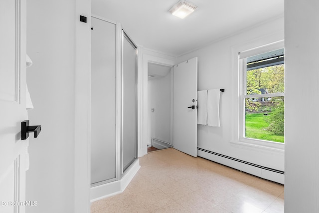 49 S St, Great Barrington, MA 01230 - bathroom featuring a shower stall, tile patterned floors, a wealth of natural light, and baseboard heating