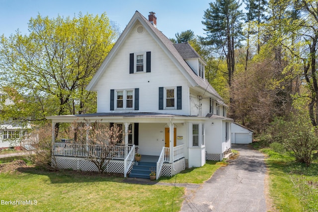 49 S St, Great Barrington, MA 01230 - farmhouse with a porch, a chimney, a front yard, an outbuilding, and a garage