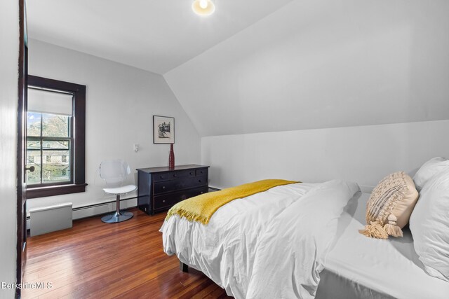 49 S St, Great Barrington, MA 01230 - bedroom with wood finished floors, a baseboard heating unit, and vaulted ceiling