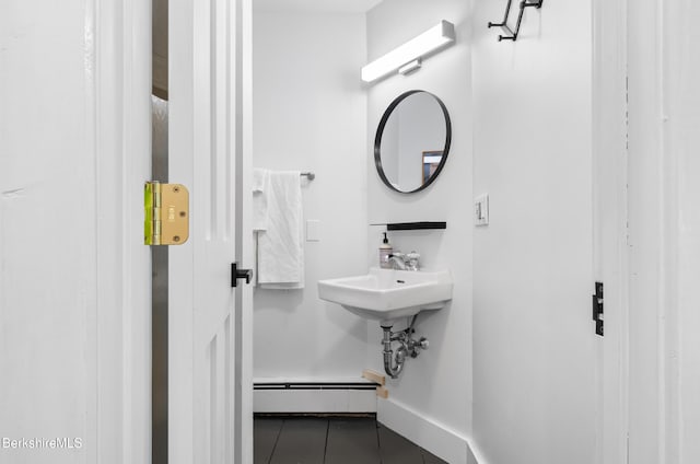 49 S St, Great Barrington, MA 01230 - bathroom featuring baseboards, a sink, tile patterned floors, and baseboard heating