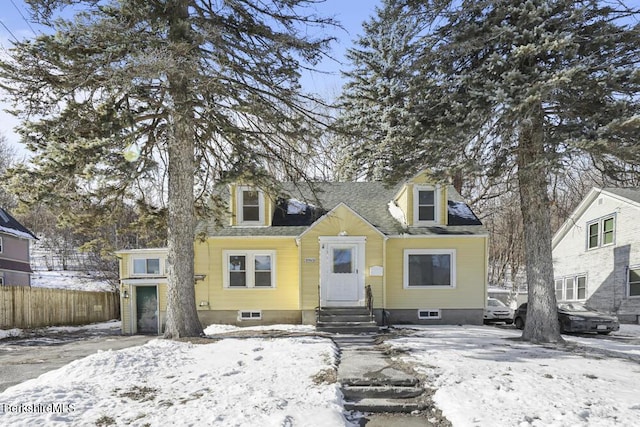 view of new england style home