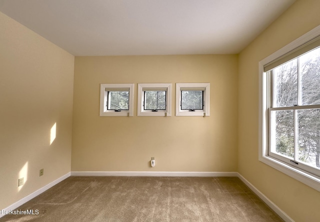 view of carpeted spare room