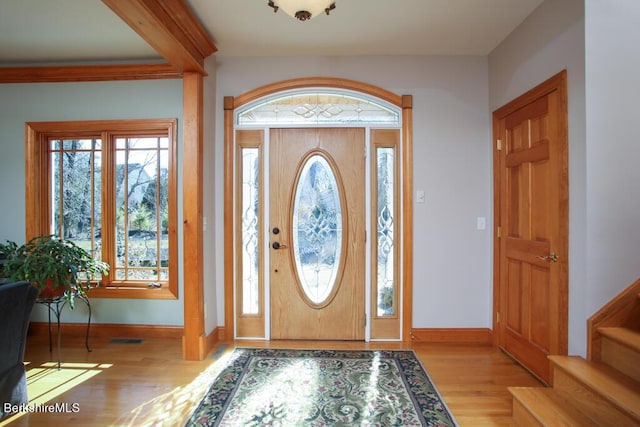 foyer with light hardwood / wood-style flooring