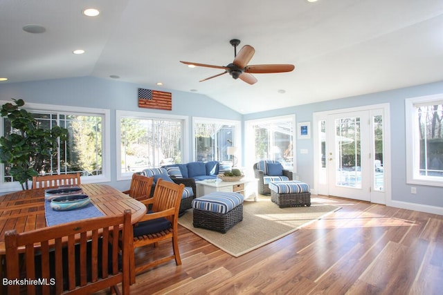 sunroom / solarium featuring ceiling fan and vaulted ceiling